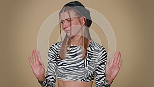 Confused upset displeased young woman pointing fingers herself, rejection, refusal, stop sign