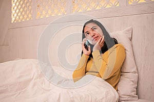 A confused woman while calling