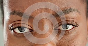 Confused, woman and closeup of eyes with frown for strain, optical care and health. Stress, question and zoom portrait