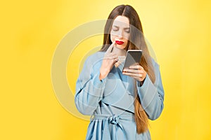 Confused woman with phone