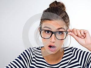 Confused, woman and portrait with surprise in studio, white background and mockup with questions. Doubt, why and student