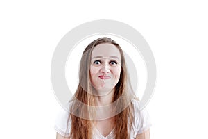 Confused young caucasian woman with disgusted facial expression and grimacing,  isolated on white background