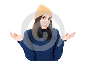Confused young woman, isolated on white background being in confusion while shrugs shoulders