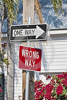 Confusing street signs one way and wrong way