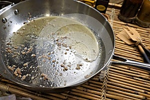 Congealed fat in frying pan