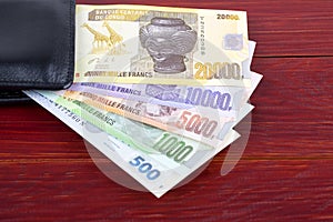 Congolese Francs in the black wallet photo