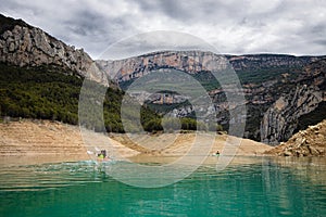 Congost de Mont Rebei, mountain gorge with azure river and canoe, kayaking in Aragon, Catalonia, Spain