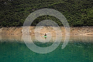 Congost de Mont Rebei, mountain gorge with azure river and canoe, kayaking in Aragon, Catalonia, Spain