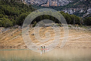 Congost de Mont Rebei, mountain gorge with azure river and canoe, kayaking in Aragon, Catalonia, Spain