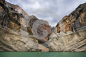 Congost de Mont Rebei, mountain gorge with azure river and canoe, kayaking in Aragon, Catalonia, Spain