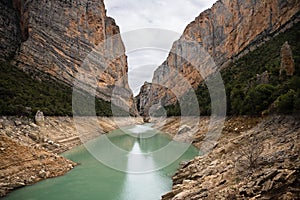 Congost de Mont Rebei, mountain gorge with azure river and canoe, kayaking in Aragon, Catalonia, Spain