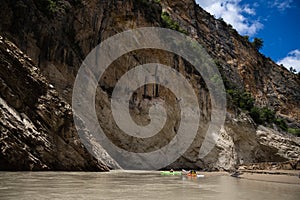 Congost de Mont Rebei, mountain gorge with azure river and canoe, kayaking in Aragon, Catalonia, Spain