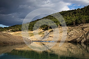 Congost de Mont Rebei, mountain gorge with azure river and canoe, kayaking in Aragon, Catalonia, Spain