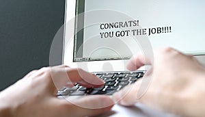 Congrats, you got the job. Typed words on computer screen
