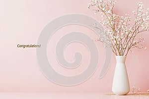 Congratulations text on soft pink background