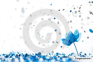 Congratulations text on a white background with silver dots