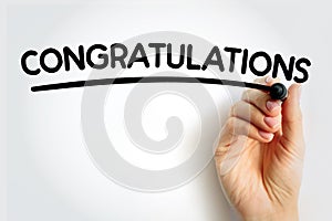 CONGRATULATIONS underlined text with marker, concept background