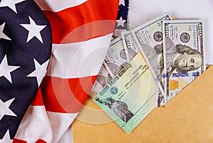 Congressional lawmakers are putting the finishing touches on a stimulus bill USA dollar cash banknote on American flag Global