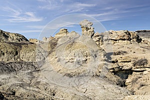 Conical cutouts reach toward the sky at the Bisti Badlands