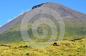 The conical Pico volcano looming over its namesake island Azores archipelago, Portugal