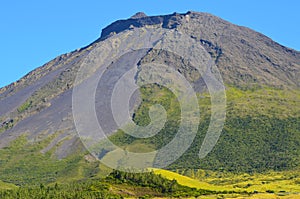 The conical Pico volcano looming over its namesake island Azores archipelago, Portugal