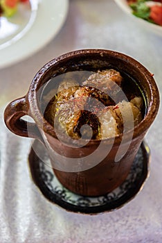 Pot of piti soup in Sheki, Azerbaijan photo