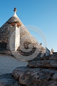 conical stone roof of a traditional trullo house, Italy