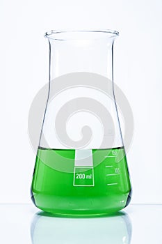 Conical temperature resistant flask with green liquid