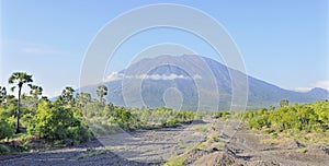 The conical volcano of Gunung Agung in Bali photo