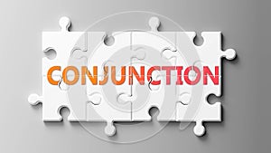 Conjunction complex like a puzzle - pictured as word Conjunction on a puzzle pieces to show that Conjunction can be difficult and