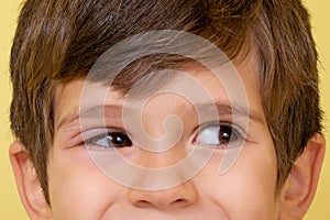 Close-up of kid 4 years old with conjunctivitis. photo