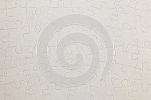 Connected blank jigsaw puzzle pieces as background