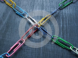 Connected colorful paper clips as a symbol of diversity and inclusion.