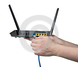 Connecting cable to router isolated on white