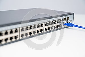 Connecting Ethernet Cable to Network Switch.