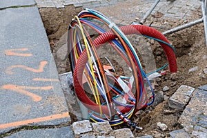 Connecting fiber optic internet connection network cables.