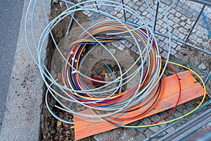 Connecting fiber optic internet connection network cables. Upgrade infrastructure in the city.