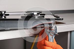 Connecting  gas hose to  hob photo