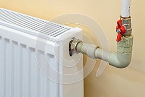 Connecting a heating radiator to old water pipes.