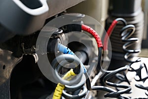 Connecting pneumatic and electrical hoses and cables to a truck semi-trailer