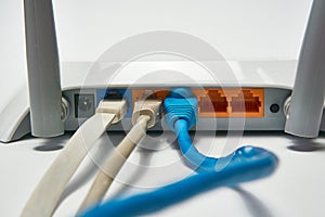 Connecting to a router, network cables connected to a router.