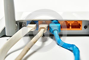 Connecting to a router, network cables connected to a router.