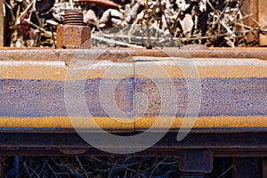 Connecting two rails. Train tracks underlay, rails and crushed stones Gap Between Rails at Fishplate