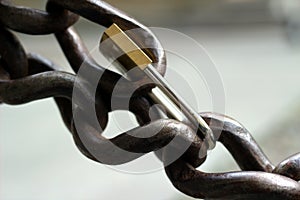 connection concept padlock on the double chain closeup