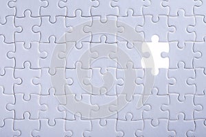 Pattern of jigsaw puzzle and one of missing hole