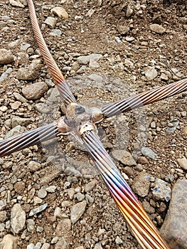 The connection of a large copper conductor as part of the electrical system