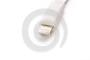 Connector lightning on a white background. This is a proprietary connector used to connect mobile devices to well-known host