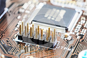 Connector on motherboard close up showing computer electronics hardware component macro detail