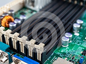 connectors on the board for connecting DIMM modules, the form factor of DRAM memory modules