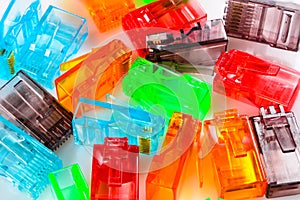 Connectors rj-45. Some multi-colored transparent connectors rj45 for network and internet. Close-up macro